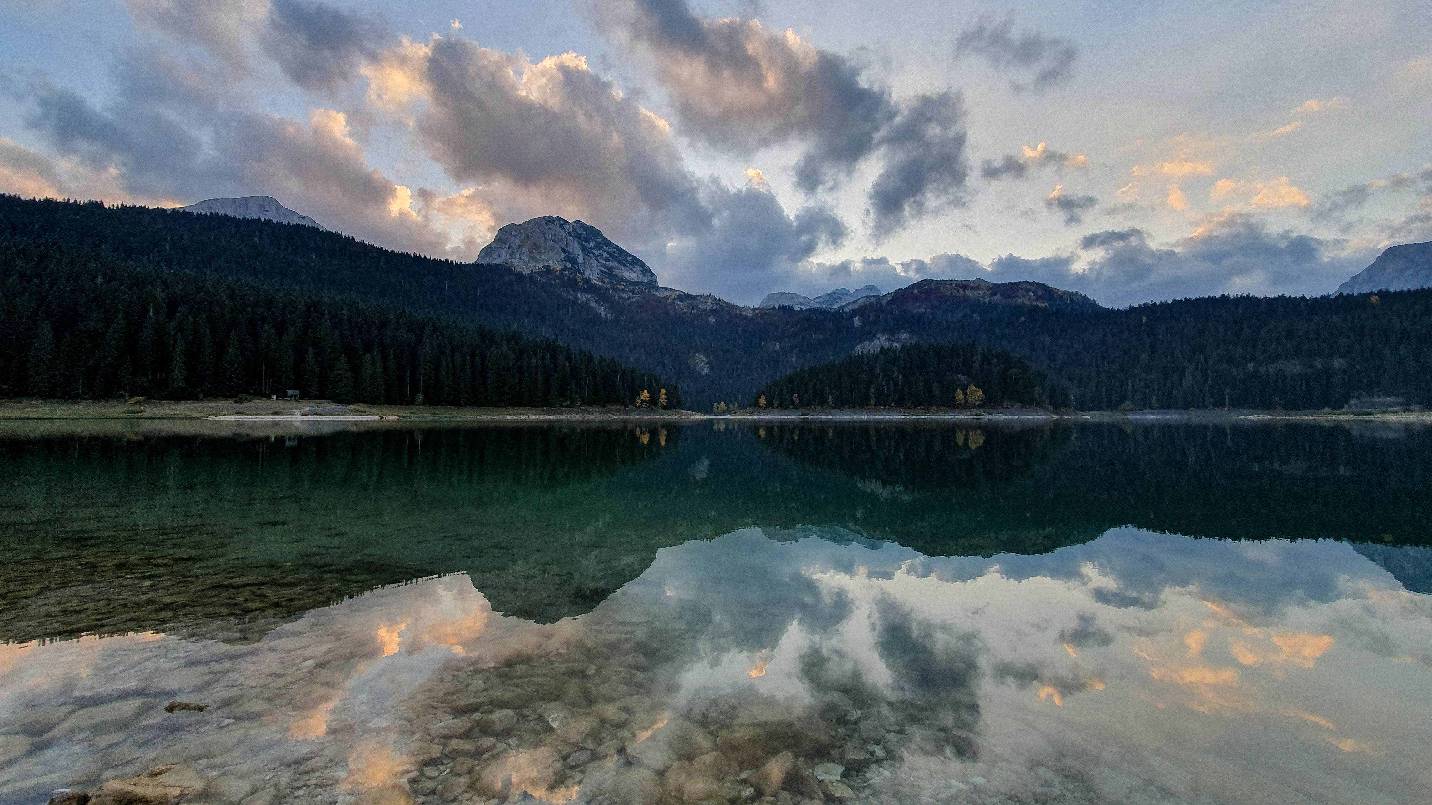 mountain near body of water